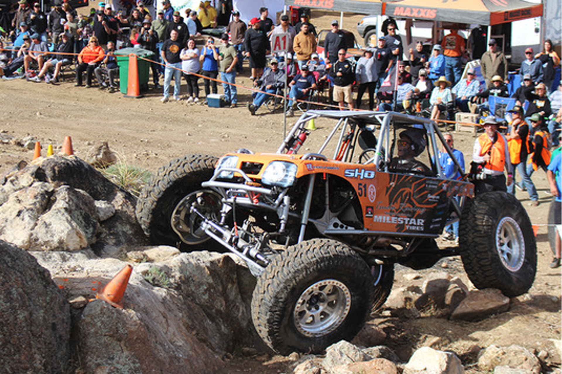 orange milestar rock crawler buggy at w.e. rock 2025