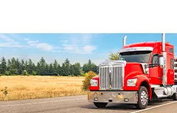 ms dr158 red semi truck on road